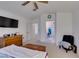 Comfortable bedroom with vaulted ceilings, ceiling fan, and ensuite bathroom at 2136 Eagle Sticks Dr. Dr, Henderson, NV 89012