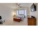 Comfortable bedroom with vaulted ceilings, ceiling fan, and bay windows at 2136 Eagle Sticks Dr. Dr, Henderson, NV 89012