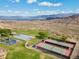 Community park featuring a playground, basketball court, and tennis courts, backed by lake and mountains at 217 Big Horn Dr # 3, Boulder City, NV 89005
