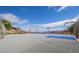 A community basketball court with multiple hoops sits against a desert backdrop, offering a great recreational space at 217 Big Horn Dr # 3, Boulder City, NV 89005