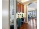 Stylish hallway with a built-in desk and views of the dining area and living room at 217 Big Horn Dr # 3, Boulder City, NV 89005