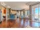 Open-concept living room featuring hardwood floors, recessed lighting, and sliding door to a balcony at 217 Big Horn Dr # 3, Boulder City, NV 89005