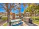 The community pool offers a picnic area, grilling area, and palm trees at 217 Big Horn Dr # 3, Boulder City, NV 89005