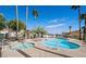 The community pool area features a separate hot tub and mountain views at 217 Big Horn Dr # 3, Boulder City, NV 89005