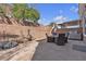 The backyard has a patio and barbeque at 223 Positive Point St, Henderson, NV 89012