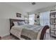 This bedroom features a bed, shelving, and window at 223 Positive Point St, Henderson, NV 89012