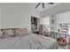 Bright bedroom with a walk-in closet, a large window, and a desk at 223 Positive Point St, Henderson, NV 89012