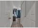 Bedroom with wood floors, and closet with white doors at 223 Positive Point St, Henderson, NV 89012