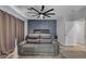 Spacious bedroom with ceiling fan, plush sofa and generous natural light at 223 Positive Point St, Henderson, NV 89012