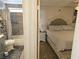 Bedroom with an ensuite bathroom featuring modern finishes, creating a private and comfortable living space at 2370 Ray Kanel Dr, Las Vegas, NV 89156
