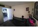 A versatile den area is located off of the main living area. It could be used as an office or playroom at 2370 Ray Kanel Dr, Las Vegas, NV 89156