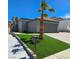 Charming exterior features a well-maintained lawn and a palm tree at 2370 Ray Kanel Dr, Las Vegas, NV 89156