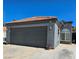 This property features an attached garage with a large driveway at 2370 Ray Kanel Dr, Las Vegas, NV 89156