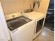 Modern laundry room with updated appliances providing efficient space for laundry needs at 2370 Ray Kanel Dr, Las Vegas, NV 89156