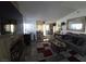 The home's living space features an inviting interior with tile floors, a fireplace, and natural light at 2370 Ray Kanel Dr, Las Vegas, NV 89156