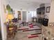Bright and open living room featuring stylish decor and furniture creating an inviting and comfortable atmosphere at 2370 Ray Kanel Dr, Las Vegas, NV 89156