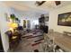 Open floor plan showcasing the living room and dining area at 2370 Ray Kanel Dr, Las Vegas, NV 89156
