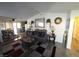 The living room provides open concept living with decorative elements and access to the kitchen and dining area at 2370 Ray Kanel Dr, Las Vegas, NV 89156