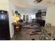 A view of the home's open concept living space, including the dining area, living room, and front entry at 2370 Ray Kanel Dr, Las Vegas, NV 89156