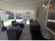 Covered patio with outdoor seating providing a comfortable space for relaxation and entertainment at 2370 Ray Kanel Dr, Las Vegas, NV 89156