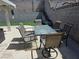 Outdoor patio with a dining table and chairs perfect for entertaining and relaxing in the backyard at 2370 Ray Kanel Dr, Las Vegas, NV 89156