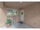 A welcoming front porch area with a decorative wreath on the door, creating a warm and inviting entrance at 2504 Courlan Dr, North Las Vegas, NV 89084