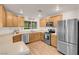 Functional kitchen features stainless steel appliances, ample counter space, and a bright, inviting atmosphere at 2504 Courlan Dr, North Las Vegas, NV 89084