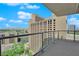 Balcony view highlighting city skyline and building exterior, framed by clear glass railings at 2700 Las Vegas Blvd # 1803, Las Vegas, NV 89109
