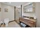 Bathroom features an enclosed glass shower, vanity and commode at 2700 Las Vegas Blvd # 1803, Las Vegas, NV 89109