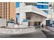 Apartment entrance featuring decorative water fountain and well-manicured landscaping at 2700 Las Vegas Blvd # 1803, Las Vegas, NV 89109