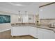 Bright kitchen featuring modern lighting fixtures and a breakfast bar at 2700 Las Vegas Blvd # 1803, Las Vegas, NV 89109