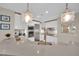 Kitchen has stainless appliances, stone counters and pendant lighting at 2700 Las Vegas Blvd # 1803, Las Vegas, NV 89109