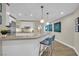 Open-concept kitchen features modern island and stainless appliances at 2700 Las Vegas Blvd # 1803, Las Vegas, NV 89109