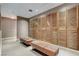 Locker room featuring wooden lockers and comfortable benches at 2700 Las Vegas Blvd # 1803, Las Vegas, NV 89109