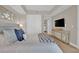 Well-decorated bedroom with a TV and ensuite bathroom access at 2700 Las Vegas Blvd # 1803, Las Vegas, NV 89109