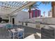 Stylish outdoor kitchen with stainless steel grills, ample counter space, and seating, ideal for outdoor gatherings at 2700 Las Vegas Blvd # 1803, Las Vegas, NV 89109