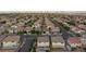 Extensive aerial shot revealing a sprawling residential area, featuring numerous homes and well-maintained streets at 3043 Jacaranda Dr, Las Vegas, NV 89117