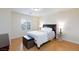 Cozy bedroom with a comfortable bed, side tables and warm lighting at 3043 Jacaranda Dr, Las Vegas, NV 89117
