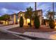 Charming two-story home with a well-manicured lawn and a two-car garage at 3043 Jacaranda Dr, Las Vegas, NV 89117