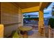 Charming front porch with outdoor seating and a view of the street at 3043 Jacaranda Dr, Las Vegas, NV 89117