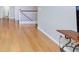 Hardwood floor detail in a living room featuring a staircase and railing at 3043 Jacaranda Dr, Las Vegas, NV 89117