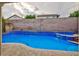 Private backyard featuring a refreshing pool with a spa and serene surroundings, ideal for relaxation and enjoyment at 3043 Jacaranda Dr, Las Vegas, NV 89117