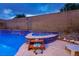 Backyard pool with accent tiles, with lounge seating and nearby landscaping at 3043 Jacaranda Dr, Las Vegas, NV 89117