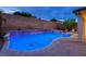 Beautiful backyard pool featuring a unique design and cool, refreshing water at 3043 Jacaranda Dr, Las Vegas, NV 89117