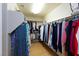 Spacious walk-in closet with ample hanging storage and shelving at 3043 Jacaranda Dr, Las Vegas, NV 89117