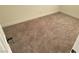 Bedroom with carpeted floor and white trim at 310 E Lake Mead Blvd, North Las Vegas, NV 89030