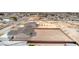An aerial view shows a house with a very large backyard that is ready for landscaping at 3120 S Torrey Pines Ave, Pahrump, NV 89048