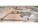 Spacious lot featuring pool, turf, privacy wall, and abundant space for future expansion at 3120 S Torrey Pines Ave, Pahrump, NV 89048