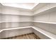 Organized walk-in pantry with custom shelving, offering ample storage space and functionality at 3120 S Torrey Pines Ave, Pahrump, NV 89048