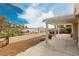 Back patio with a pergola and garden; perfect for outdoor gatherings at 344 Mill Hollow Rd, Las Vegas, NV 89107